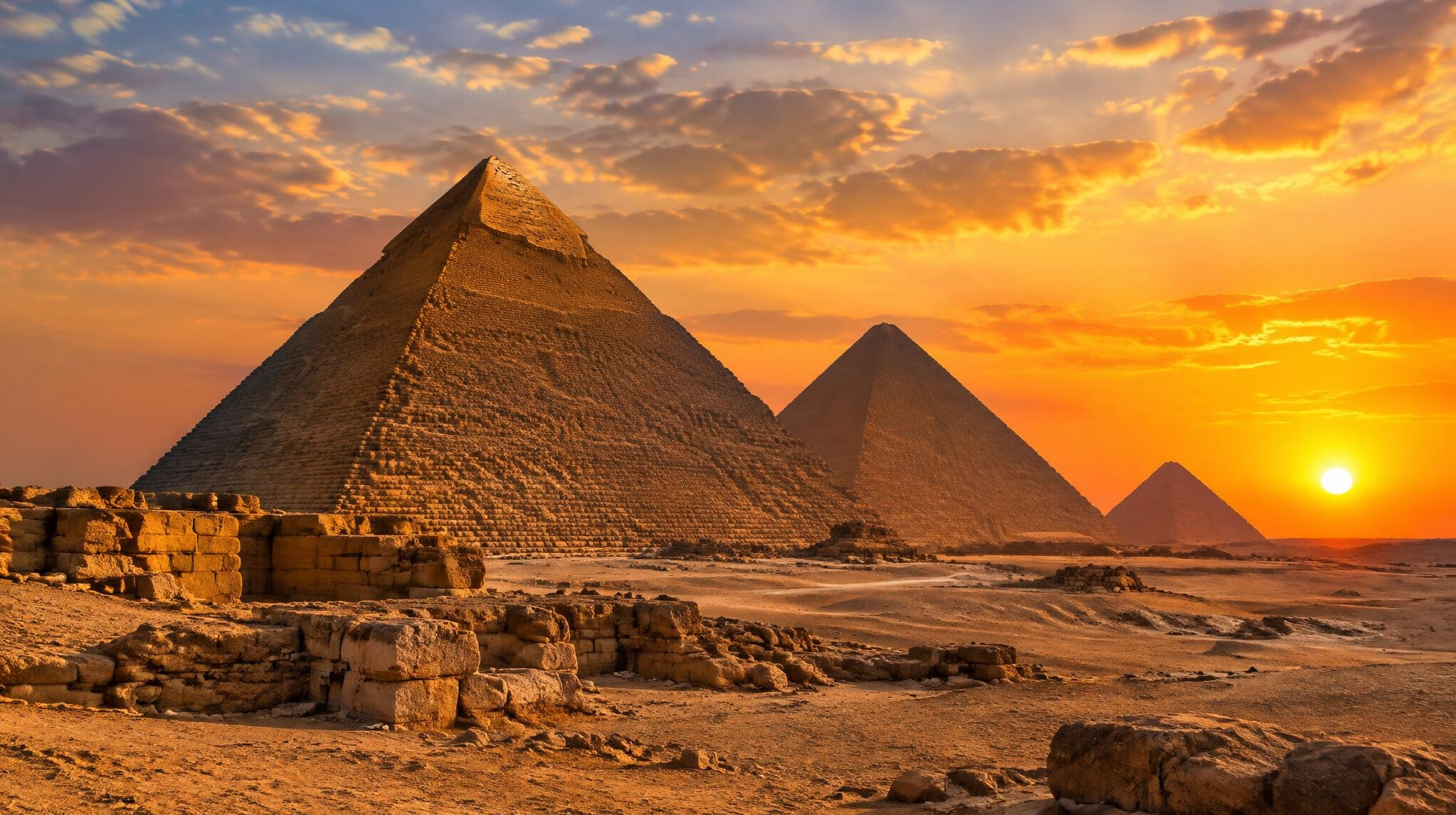 ancient stone pyramid at sunset